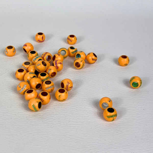 Perles Tribales – Perles en bois colorées aux motifs ethniques
