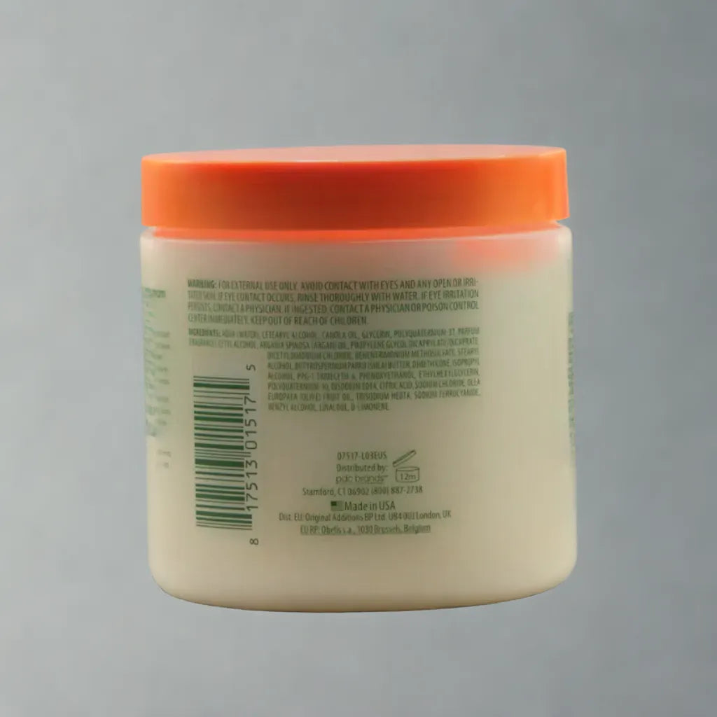 Crème réparatrice revitalisante sans rinçage au beurre de karité et à l'huile d'argan Cantu