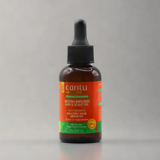 Huile capillaire fortifiante pour cheveux et cuir chevelu infusée de biotine Cantu