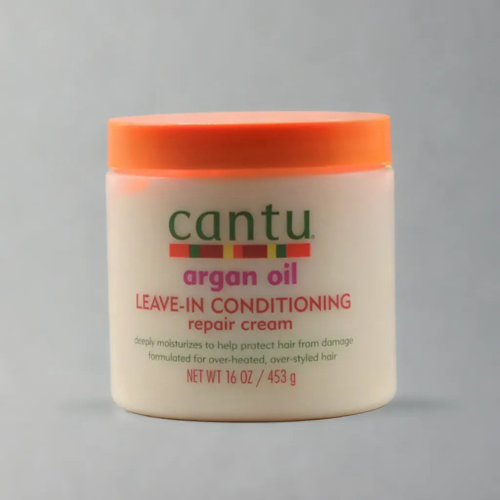 Crème réparatrice revitalisante sans rinçage au beurre de karité et à l'huile d'argan Cantu