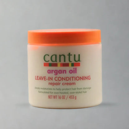 Crème réparatrice revitalisante sans rinçage au beurre de karité et à l'huile d'argan Cantu