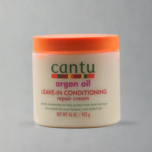 Crème réparatrice revitalisante sans rinçage au beurre de karité et à l'huile d'argan Cantu